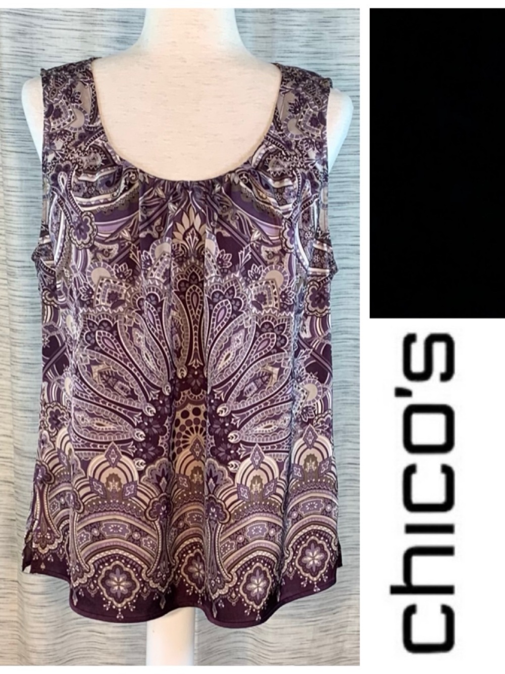 Chico’s dark purple paisley sleeveless blouse.